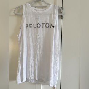 Peloton tank top. White with peloton written in silver glitter. Size XL